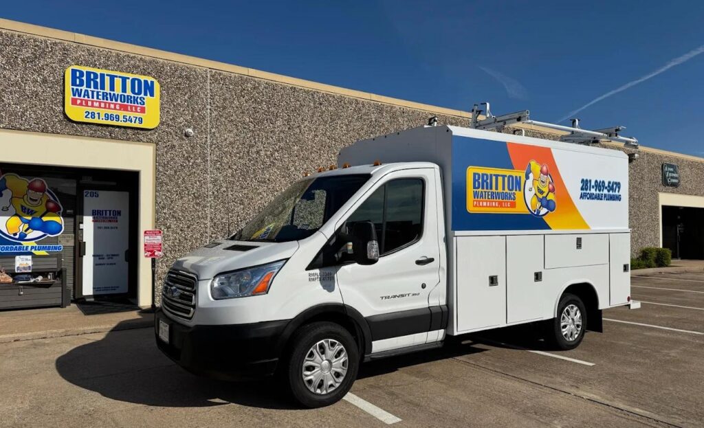 commercial service van parked outside a business